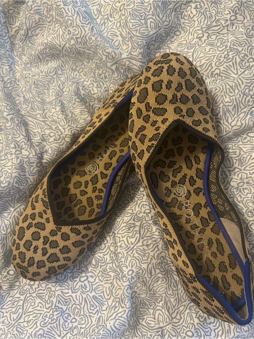 Rothy's Leopard Print Ballet Flats in Tan and Black with Blue Trim